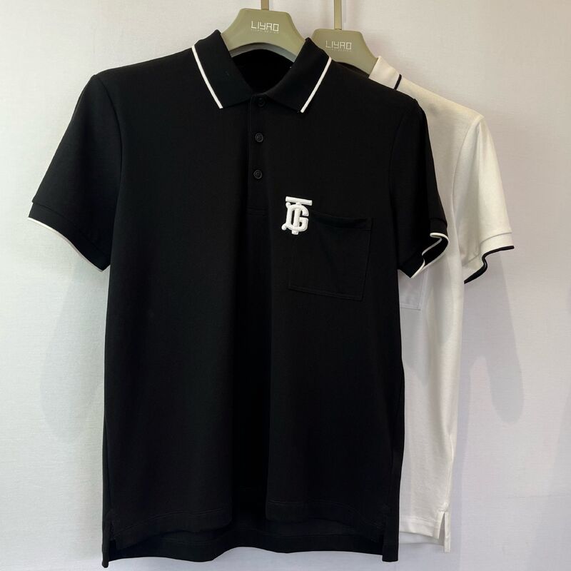 Polo brodé avec logo pour homme | Noir avec bordure blanche, poche poitrine et design tendance monogrammé, polo piqué pour homme