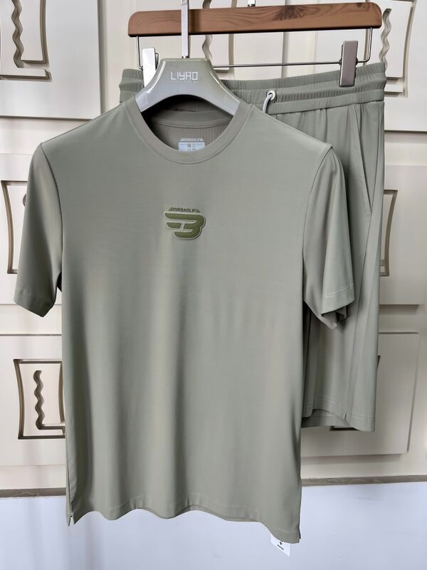 Vente à chaud pour hommes en été respirant solide léger Polo manches courtes ensembles en polyester / coton tissu