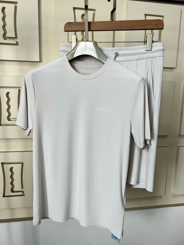 Vente à chaud pour hommes en été respirant solide léger Polo manches courtes ensembles en polyester / coton tissu