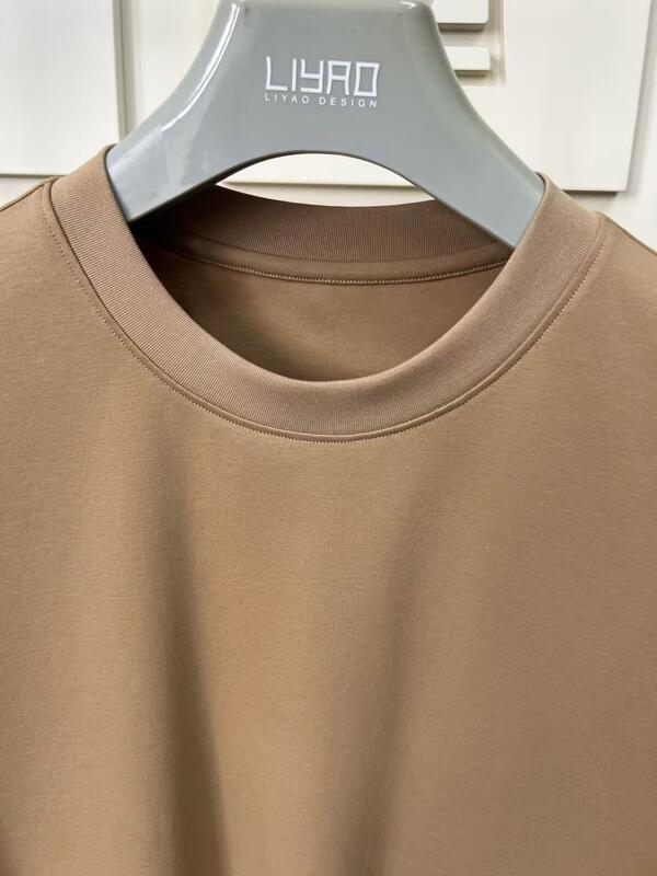 C'est un vêtement pour homme à manches courtes, confortable, style vintage, simple, couleur solide,