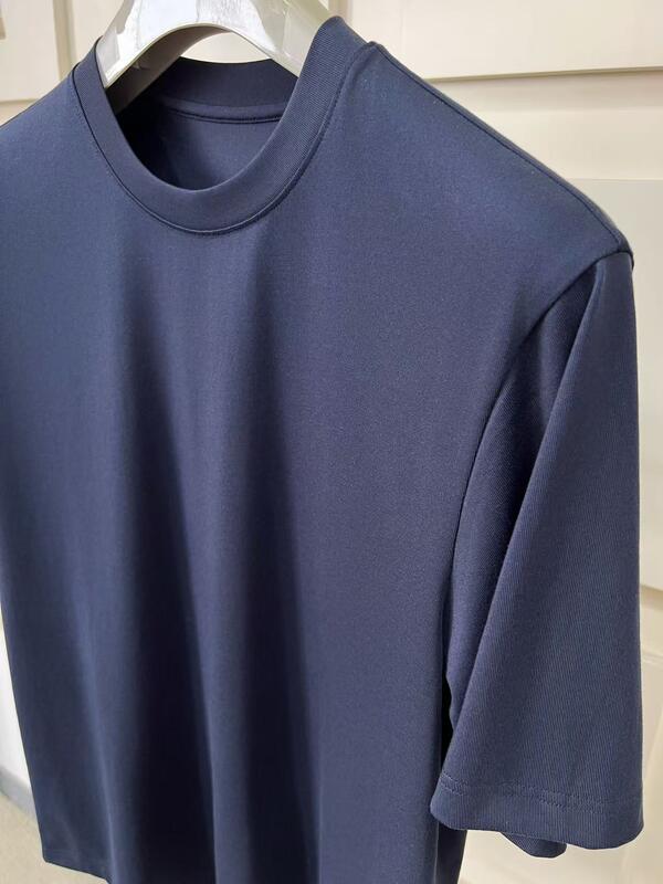 C'est un vêtement pour homme à manches courtes, confortable, style vintage, simple, couleur solide,